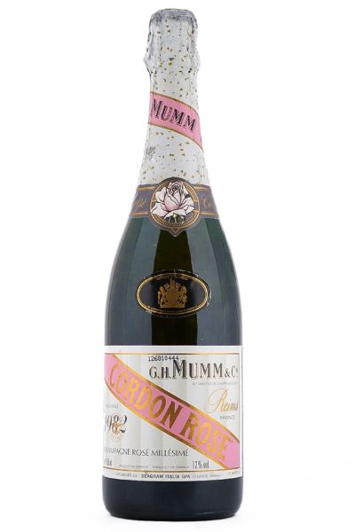 Picture of 1982 Champagne Mumm Cordon Rosé, slightly damaged label, good colour, signs of gas